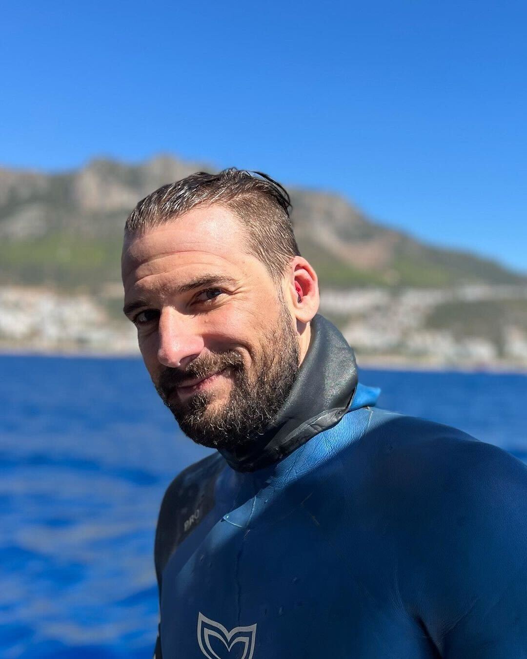 diver with diving ear plugs